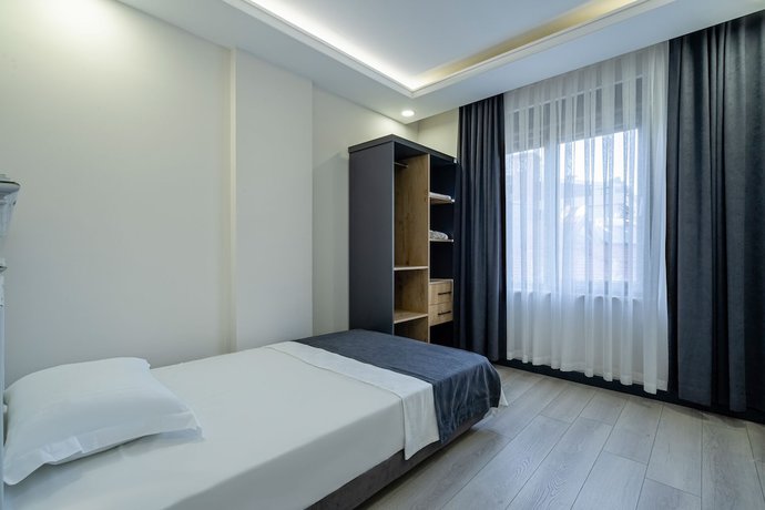 Imagen de la habitación del Eluxio Suite Hotel. Foto 18