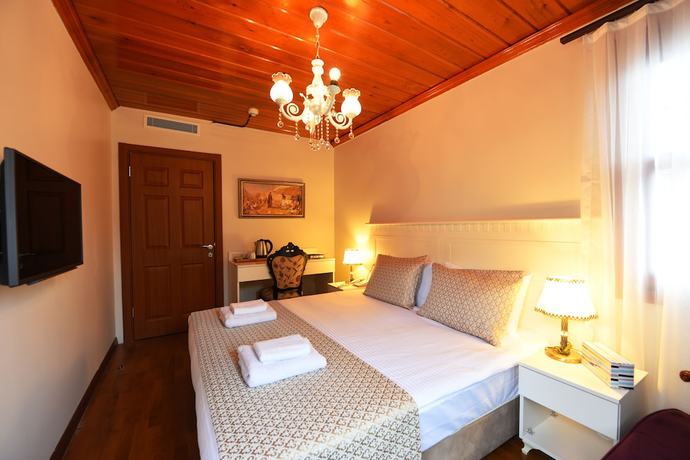 Imagen de la habitación del Elyka Hotel. Foto 16