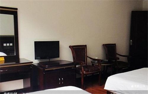 Imagen general del Emeishan Sanyuan Shuzhuang Home Stay. Foto 3