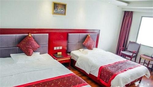 Imagen general del Emeishan Sanyuan Shuzhuang Home Stay. Foto 7