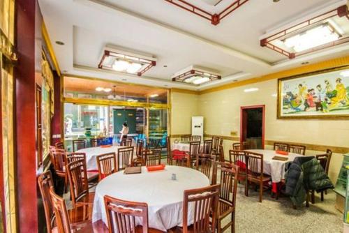 Imagen de la habitación del Emeishan Ziqiang Inn. Foto 8