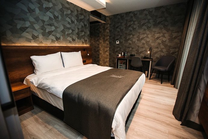 Imagen de la habitación del Emens Hotel. Foto 10