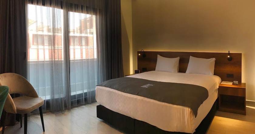 Imagen de la habitación del Emens Hotel. Foto 11