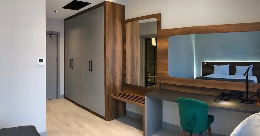 Imagen de la habitación del Emens Hotel. Foto 15