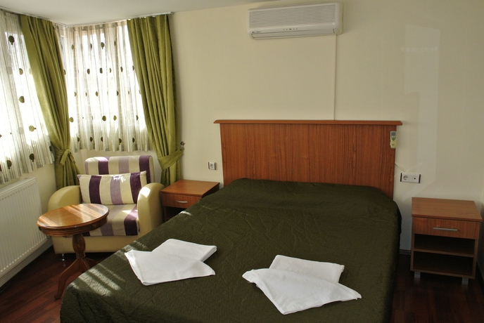 Imagen de la habitación del Emirhan Inn Apartment. Foto 8