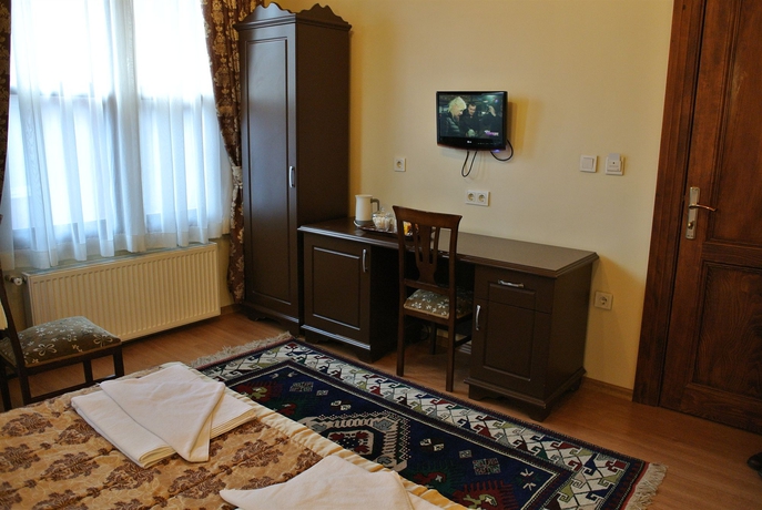 Imagen de la habitación del Emirhan Inn Apartment. Foto 10