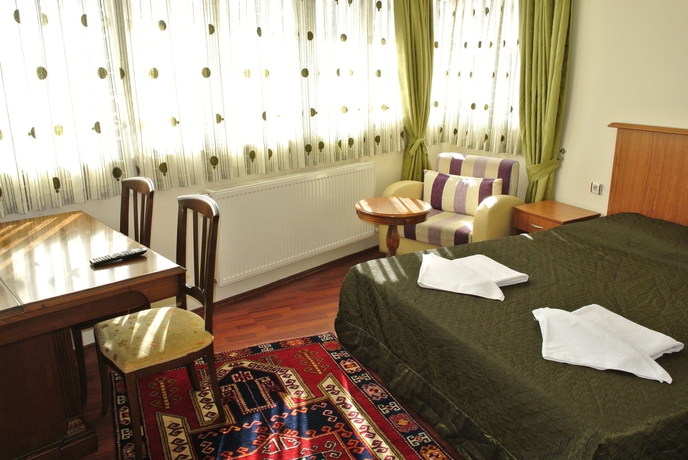 Imagen de la habitación del Emirhan Inn Apartment. Foto 12