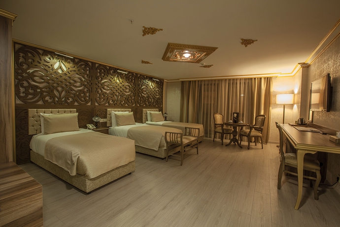 Imagen de la habitación del Empire Suite Hotel. Foto 10