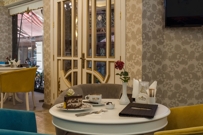 Imagen del bar/restaurante del Empire Suite Hotel. Foto 8