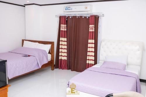 Imagen de la habitación del Empress Island Hotel. Foto 17