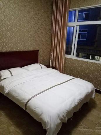 Imagen de la habitación del En Shi 688 Hotel. Foto 7