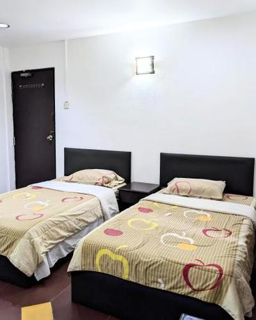 Imagen de la habitación del EnE Sri Cemerlang. Foto 16