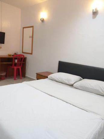 Imagen de la habitación del EnE Sri Cemerlang. Foto 17