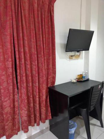 Imagen de la habitación del EnE Sri Cemerlang. Foto 18