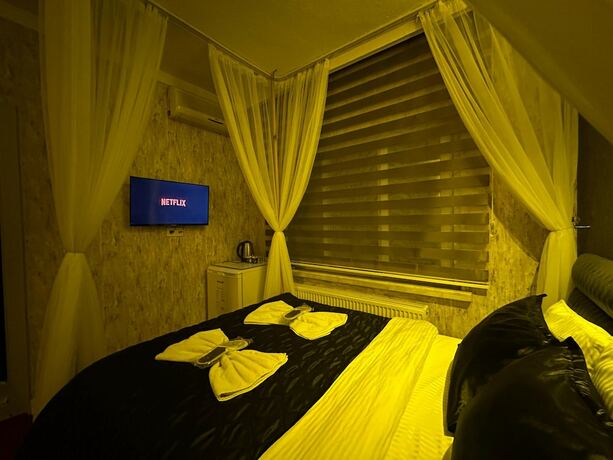 Imagen de la habitación del Enjoy House Boutique Hotel. Foto 16
