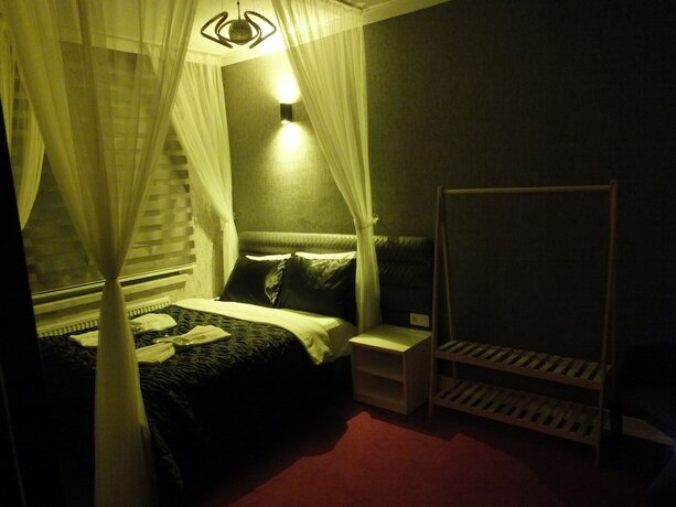 Imagen de la habitación del Enjoy House Boutique Hotel. Foto 18