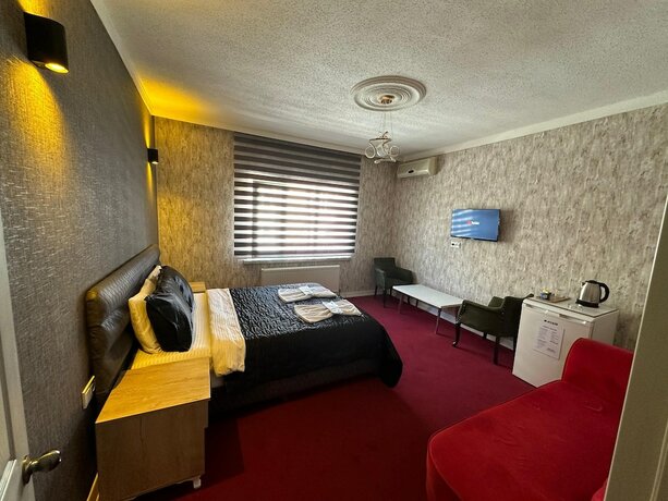 Imagen de la habitación del Enjoy House Boutique Hotel. Foto 19
