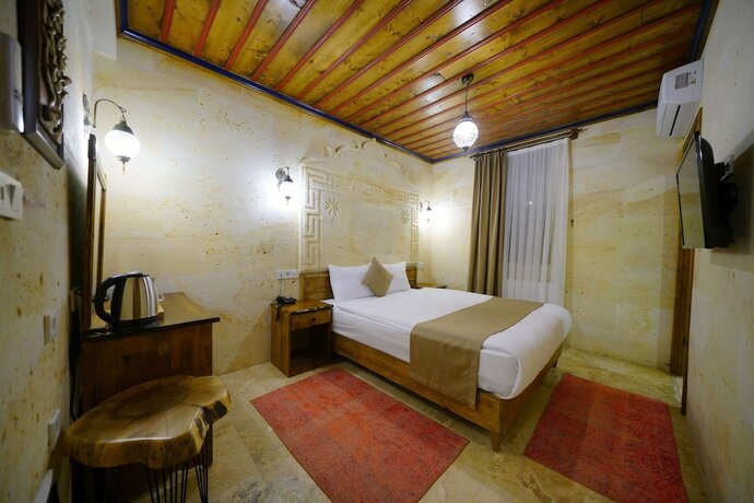 Imagen de la habitación del Enjoy Stone Hotel. Foto 16
