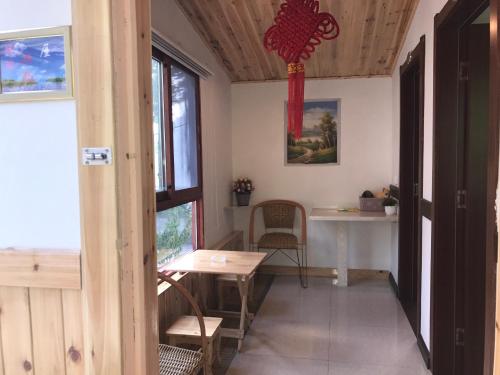 Imagen general del Enshi Grand Canyon Chunlun Farmstay. Foto 2