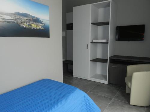 Imagen de la habitación del Erasmus Hotel. Foto 8