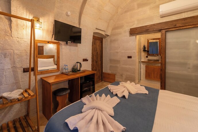 Imagen de la habitación del Escape Cave Suites. Foto 19