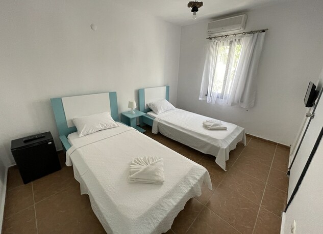 Imagen de la habitación del Esmana Otel. Foto 15
