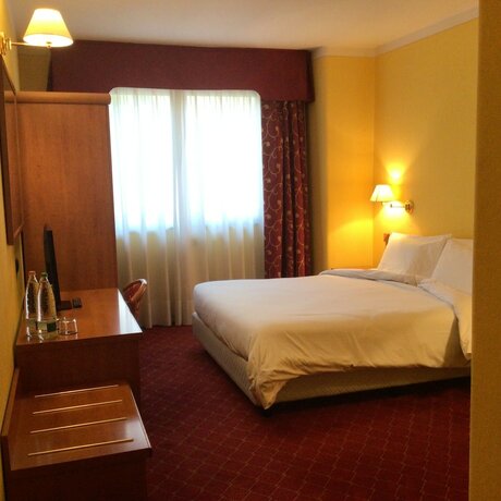 Imagen de la habitación del Essenza Hotel. Foto 7