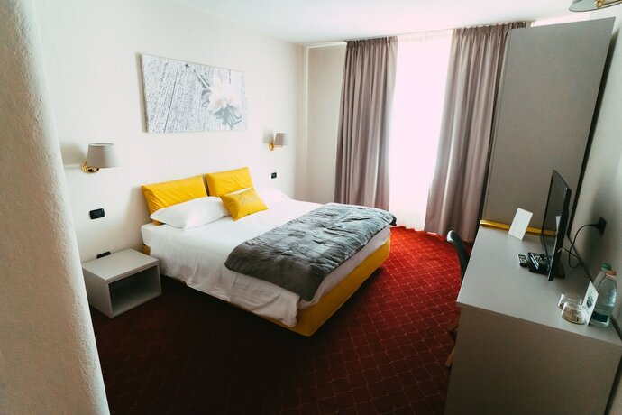 Imagen de la habitación del Essenza Hotel. Foto 8