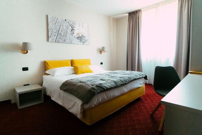 Imagen de la habitación del Essenza Hotel. Foto 9