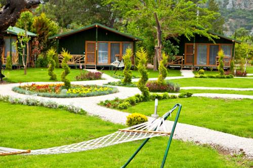 Imagen de la habitación del Etenna Beach Bungalows, Çirali. Foto 1