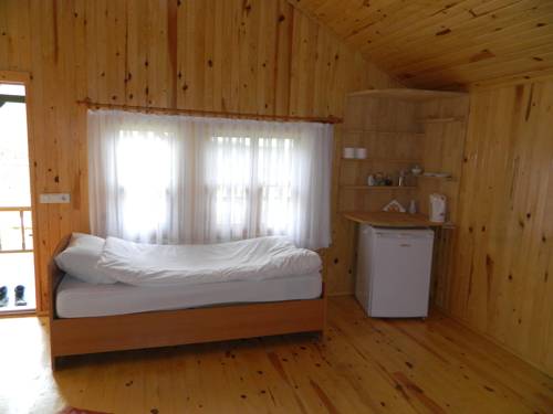 Imagen de la habitación del Etenna Beach Bungalows, &Ccedil;irali. Foto 6