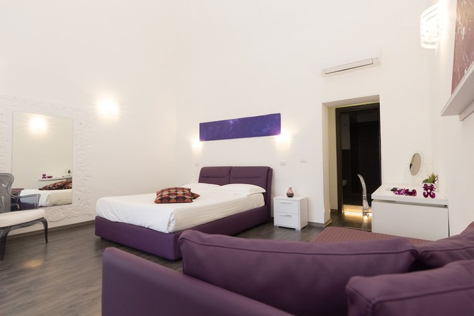 Imagen de la habitación del Etna Suite. Foto 15