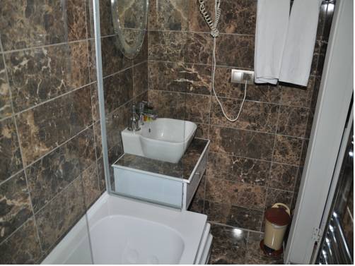 Imagen de la habitación del Evim Apart Hotel. Foto 5