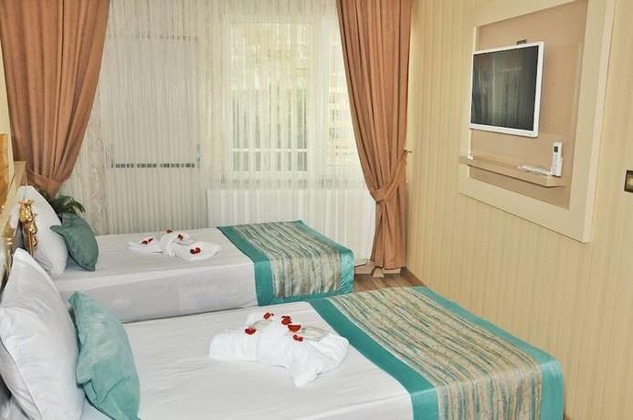 Imagen de la habitación del Evim Hotel. Foto 9