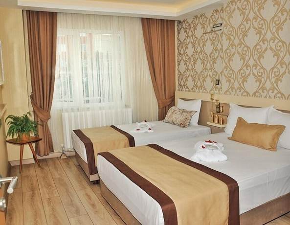 Imagen de la habitación del Evim Hotel. Foto 15