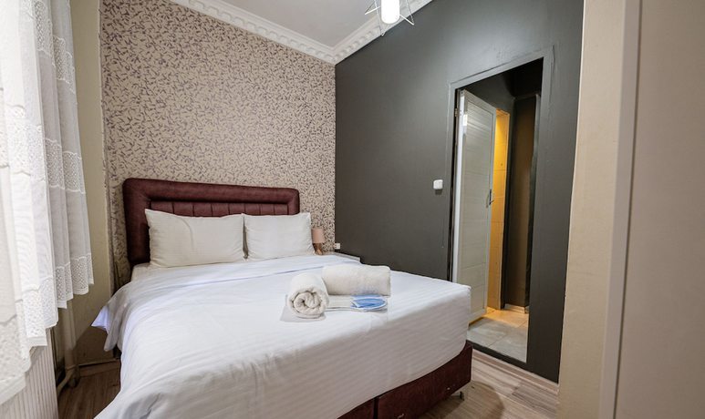 Imagen de la habitación del Evin Suit Hotel. Foto 3