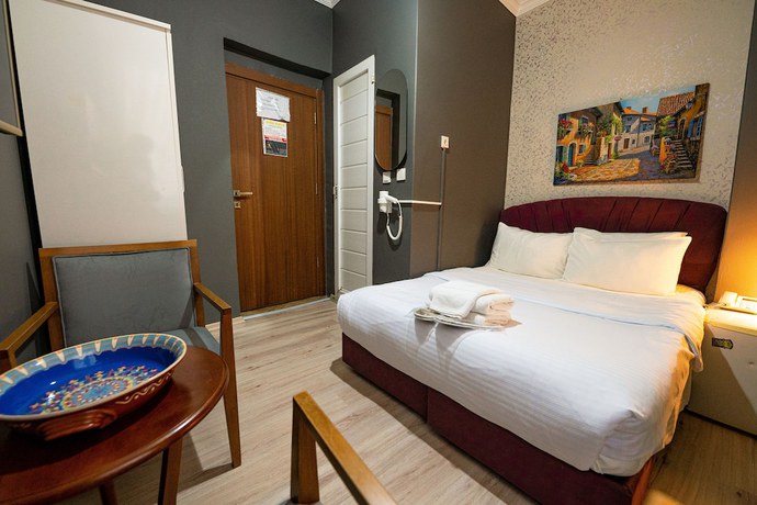 Imagen de la habitación del Evin Suit Hotel. Foto 5