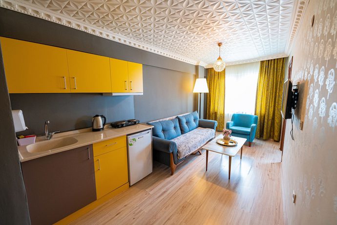 Imagen de la habitación del Evin Suit Hotel. Foto 15