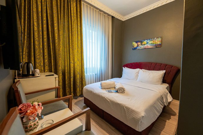 Imagen de la habitación del Evin Suit Hotel. Foto 16