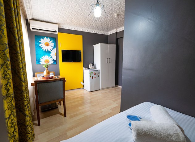 Imagen de la habitación del Evin Suit Hotel. Foto 17