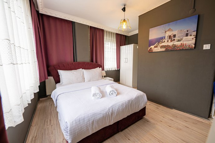 Imagen de la habitación del Evin Suit Hotel. Foto 20