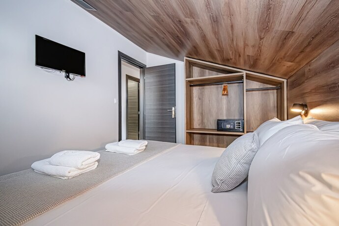 Imagen de la habitación del Evitel Luxury Living. Foto 19