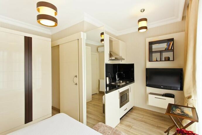 Imagen de la habitación del Evoda Residence. Foto 11