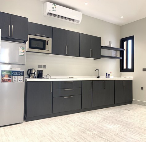 Imagen de la habitación del Ewaa Alarab Alarid District. Foto 3