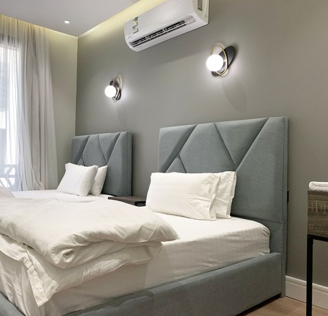 Imagen de la habitación del Ewaa Alarab Alarid District. Foto 4