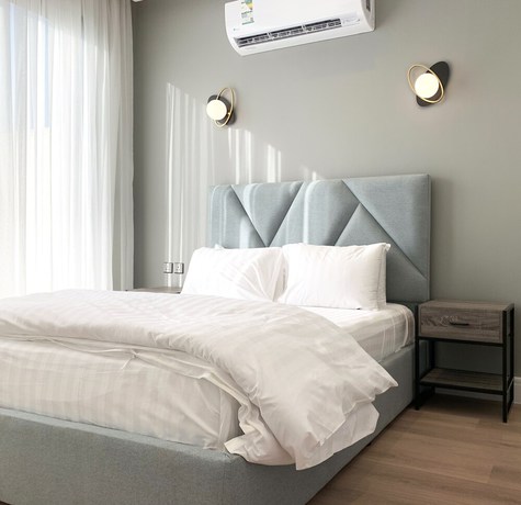 Imagen de la habitación del Ewaa Alarab Alarid District. Foto 9