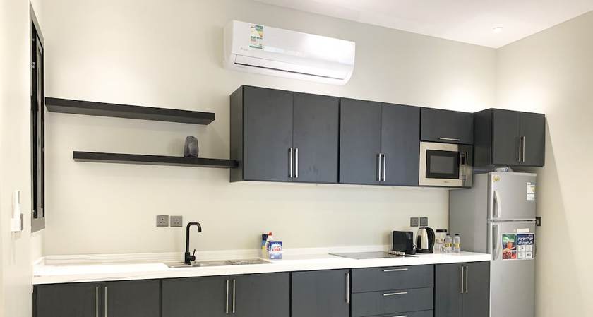 Imagen de la habitación del Ewaa Alarab Alarid District. Foto 19