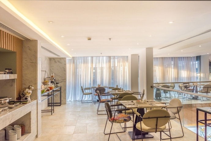 Imagen del bar/restaurante del Ewaa Express Hotel - AlRawda. Foto 4