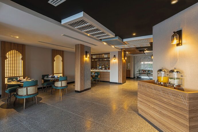 Imagen del bar/restaurante del Ewaa Express Hotel-al Shati. Foto 12