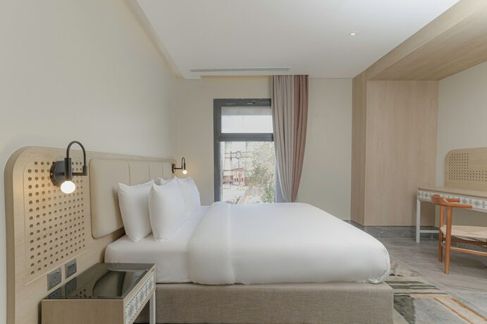 Imagen de la habitación del Ewaa Express Hotel-al Shati. Foto 14